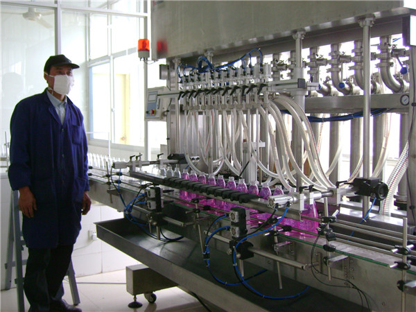 şüşə maye doldurma maşını